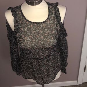 Peep shoulder sheer top